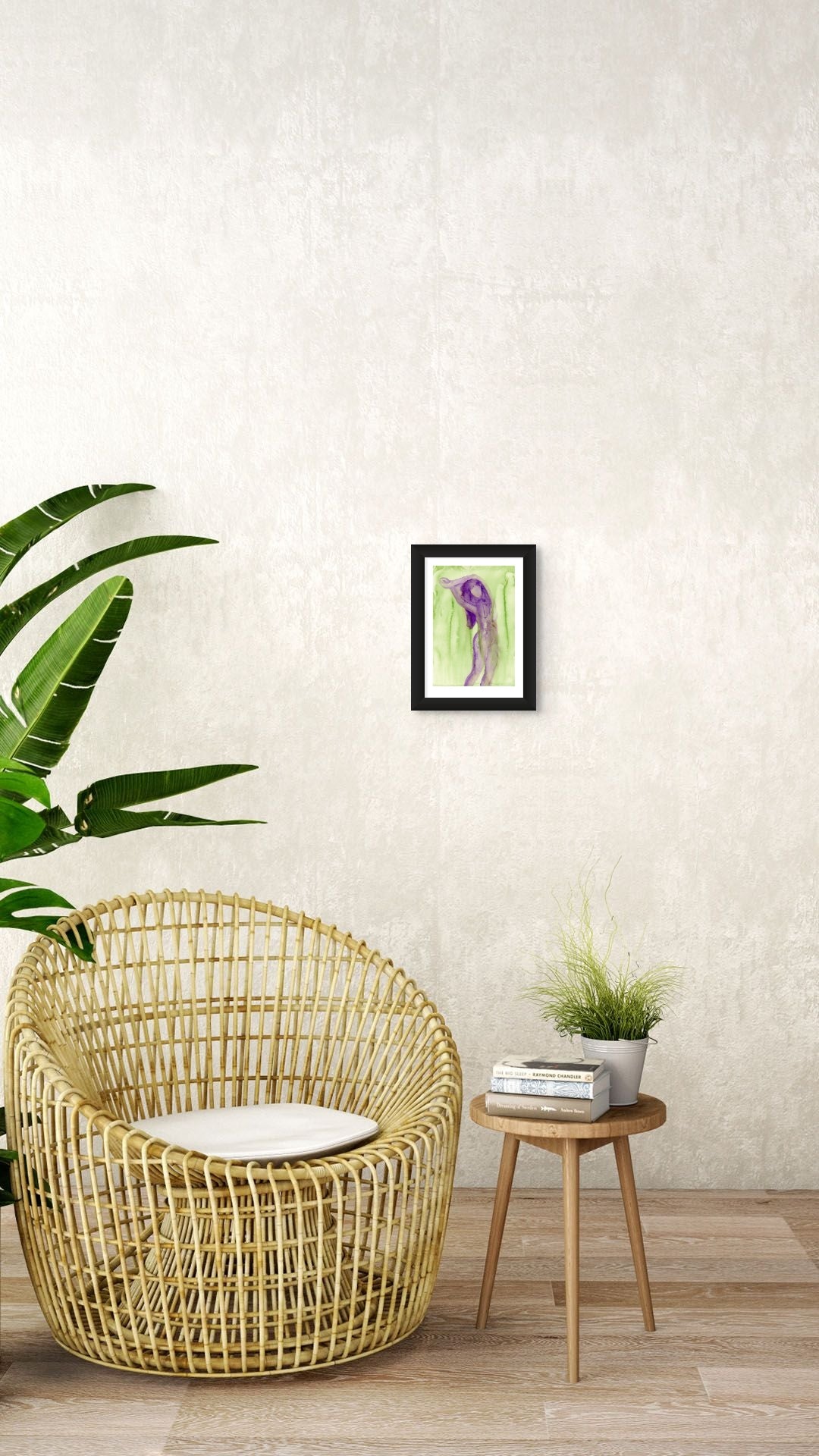 Limited Edition Fine Art Giclée Print of a watercolour female figure embodying the season of Spring. The colours are a beautiful Purple and Fresh Green, A4 sized displayed on a wall.